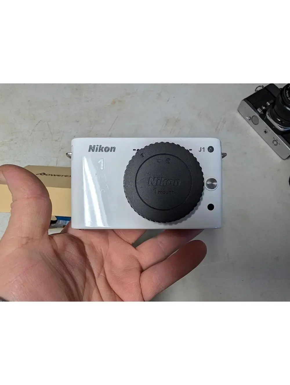 Nikon 1 J1 Mirrorless Digital Camera with Charger and Extra Batteries